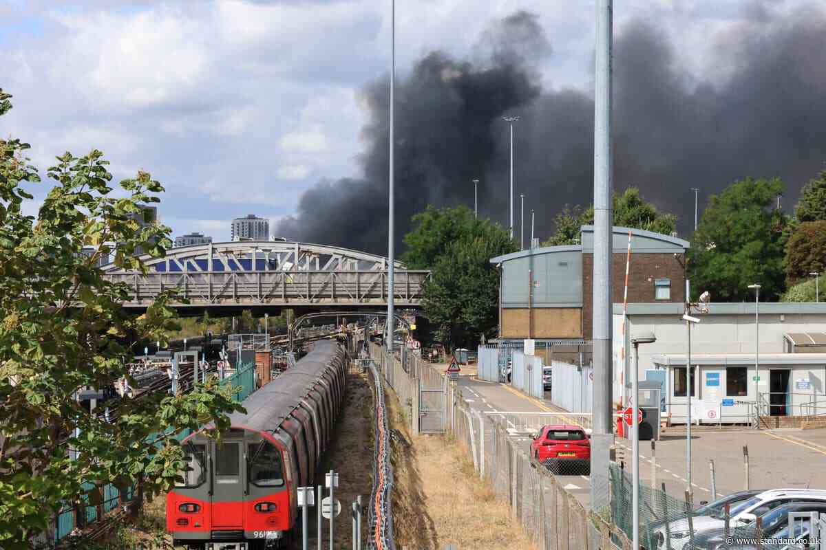Third day of Tube disruption as 'toxic air' from huge blaze near Wembley Stadium prevents trains running