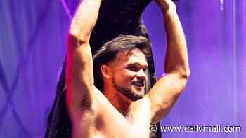 Gareth Gates sheds his squeaky clean Pop Idol persona as he strips off during racy Manchester Pride performance