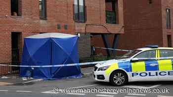 Murder investigation launched in Salford following death of man who fell from balcony