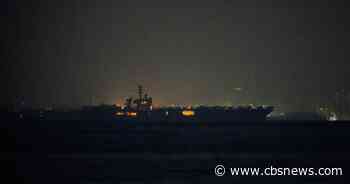 USS Lincoln sails past Singapore after 9-month deployment