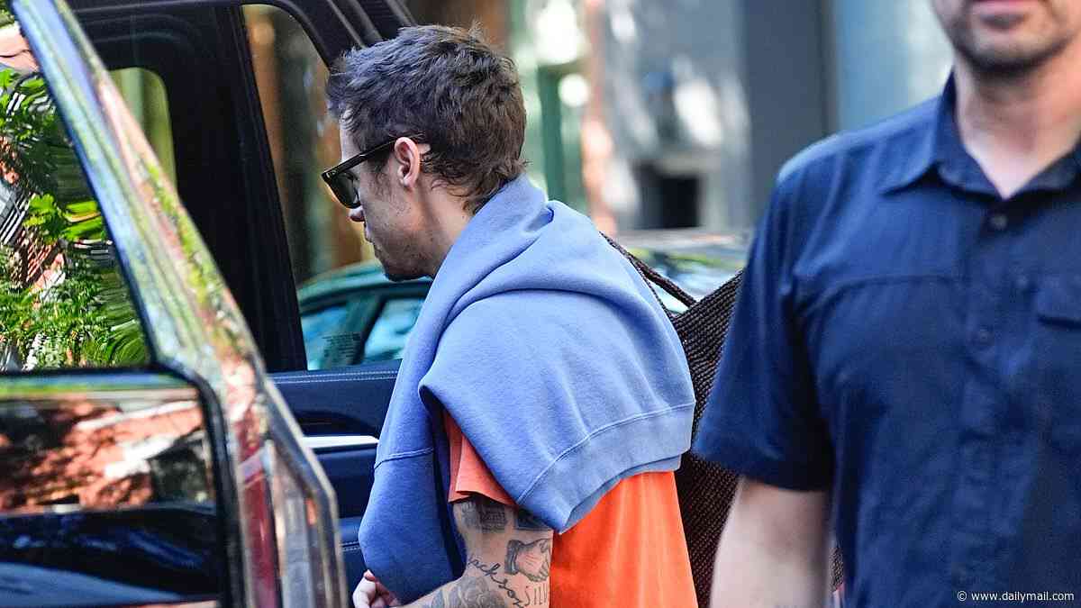 Harry Styles dashes to his New York show in his signature shorts before cracking cheeky joke about his ex Taylor Swift's Madison Square Garden wedding during gig