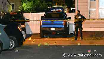 At least two killed and nine injured after shots were fired on quiet street in New Jersey's bustling capital