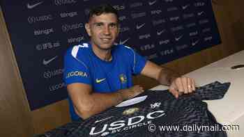 Chelsea complete £7.5m Emiliano Martinez signing: Argentina star handed immediate START as he vows to help the Blues 'win titles' after sealing move from Aston Villa