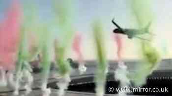 Terrifying moment airliners fly just feet over crowded sports stadium in 'dangerous' stunt