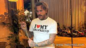 Olivia Attwood shares smitten snap of boyfriend Pete Wicks in an 'I love my girlfriend' T-shirt after 'hard launching' their relationship