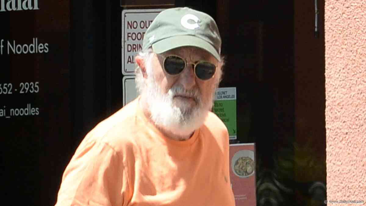 Horror icon, 78, who starred in 70s slasher film and co-wrote action flick starring Kurt Russell seen on rare outing… can you guess who he is?