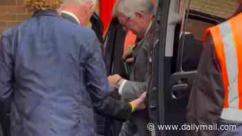 Sir Alex Ferguson enters Old Trafford with his lower left leg in a protective boot - as legendary ex-Manchester United manager arrives for their Premier League clash against Ipswich Town