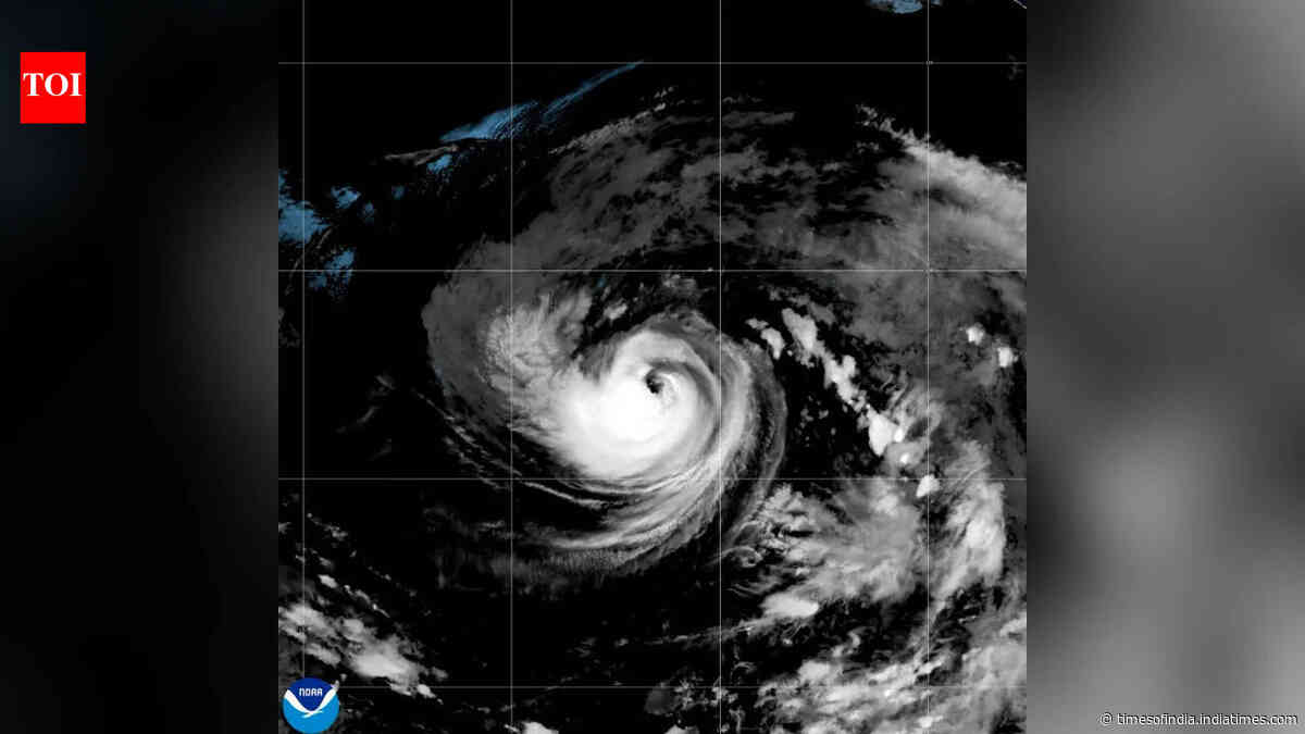 Tropical Storm Karina strengthens into a hurricane in the Pacific