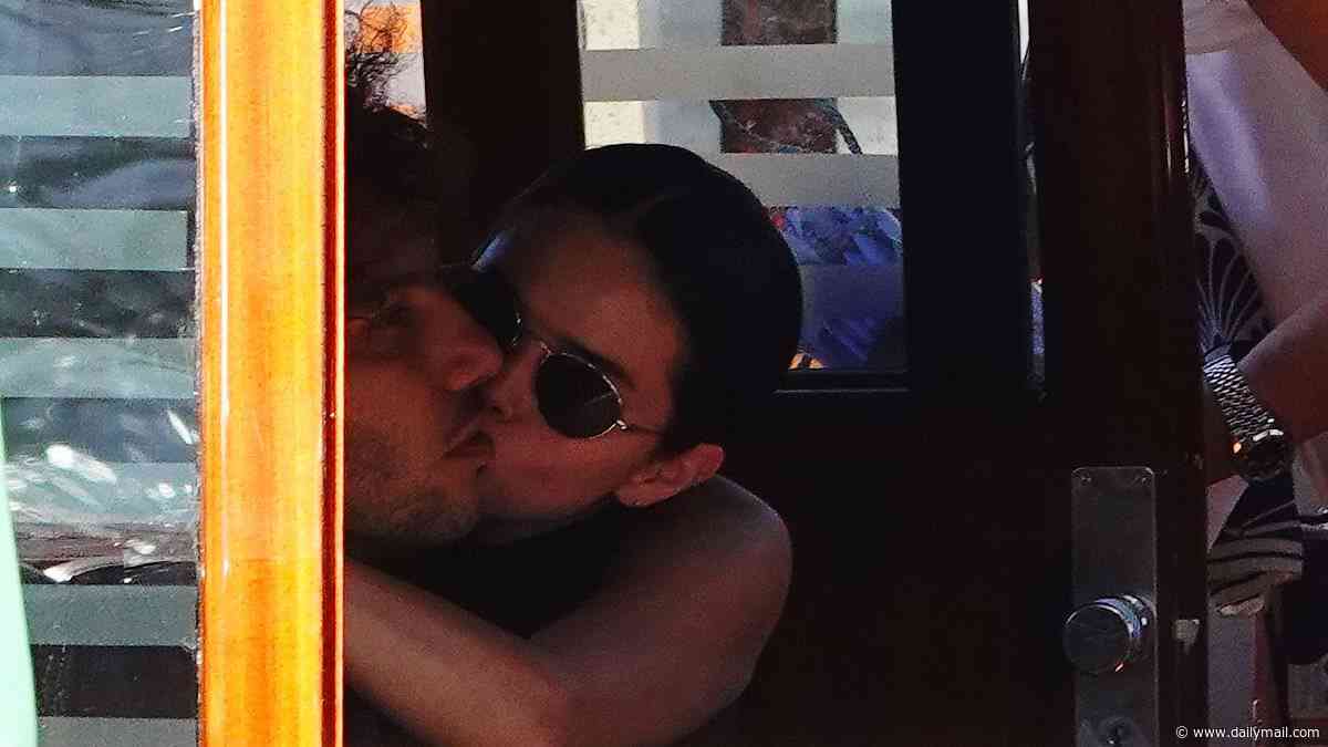 Selena Gomez kisses husband Benny Blanco as they enjoy a romantic water taxi ride in Venice