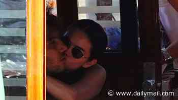 Selena Gomez kisses husband Benny Blanco as they enjoy a romantic water taxi ride in Venice