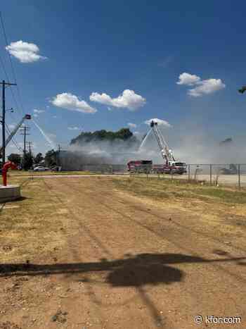 Woman in custody after apartment fire in Northwest Oklahoma City