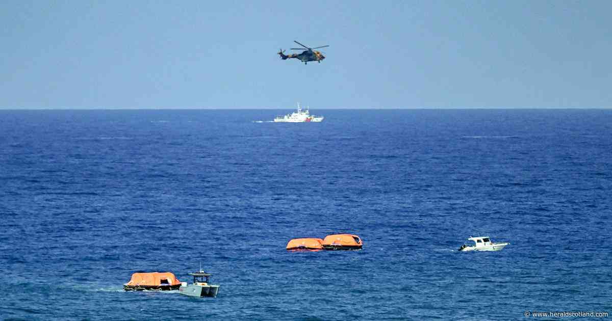 At least eight dead as ferry with nearly 270 on board capsizes