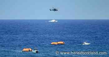 At least eight dead as ferry with nearly 270 on board capsizes