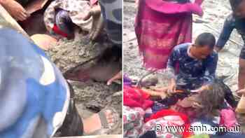 Girl rescued from rubble after Nepal floods