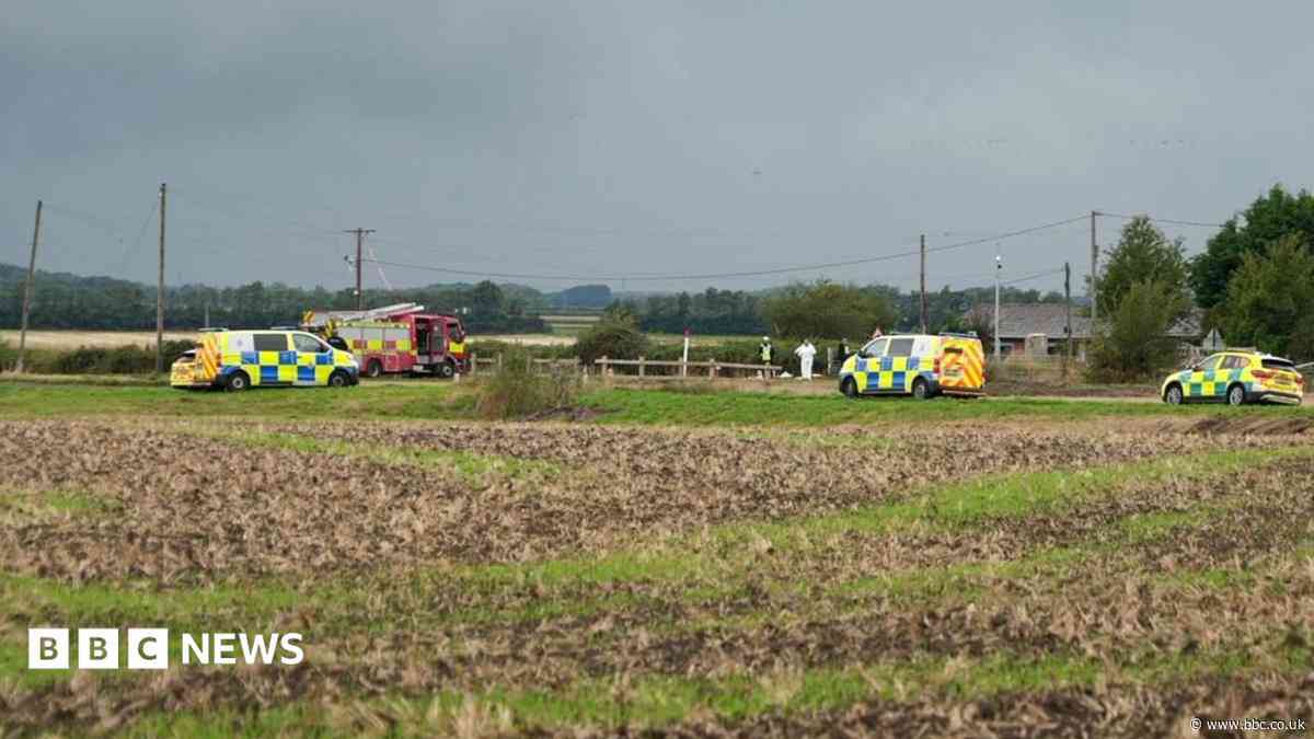 Man dies after train hits van on crossing