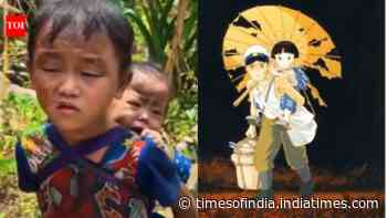 Nepal floods: Little boy seen carrying his younger sister in search of parents