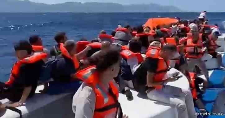 New video shows terrifying scramble for lifejackets before ferry capsizes