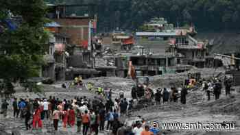 Five Australians were having breakfast at a Nepalese hotel. Then came a wall of water