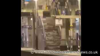 WATCH: Moment rain gushes down stairs at Manchester Piccadilly station amid huge storm