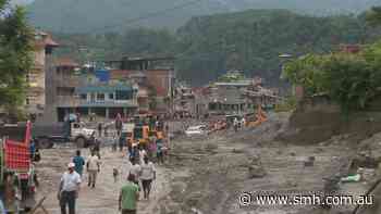 Race to rescue 900 trapped workers as floodwaters recede in Nepal