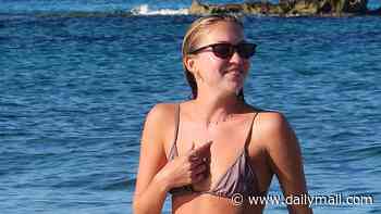Lila Moss looks just like model mum Kate as she sports a tiny bikini on the beach in Formentera