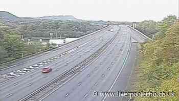 Man dies after being hit by three cars on M56