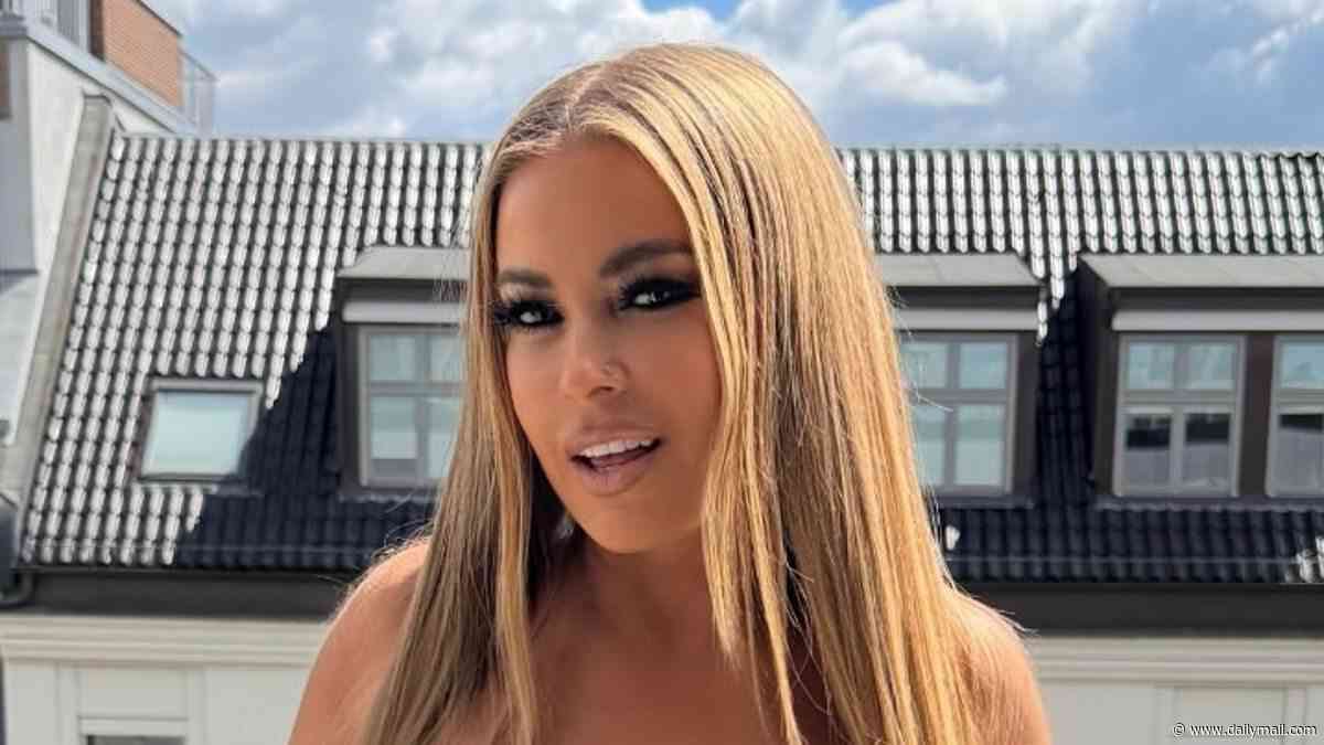 Baywatch bombshell Carmen Electra, 54, shocks fans as she poses topless in very racy new photos