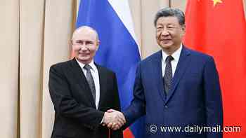 Putin meets his ally Chinese President Xi Jinping as they discuss Ukraine amid growing fears Russia is about to escalate war