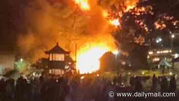 Massive fire sparked by a balloon destroys popular Bali restaurant as tourists run for their lives