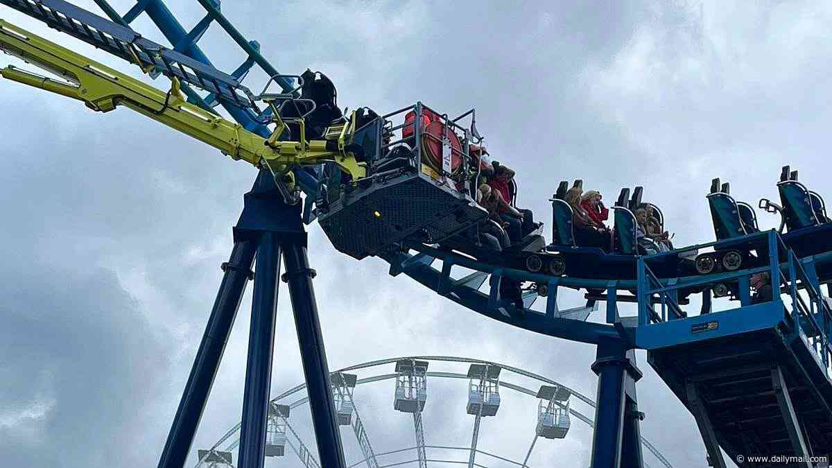 Twenty-seven people are trapped on 'Wipeout' rollercoaster 50ft in the air for more than three hours at Suffolk theme park