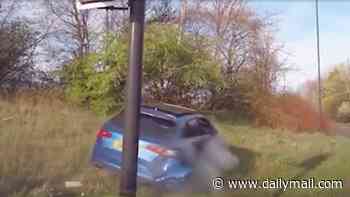 Moment police ram 'Mad Kenny' road menace during 125mph chase through busy traffic
