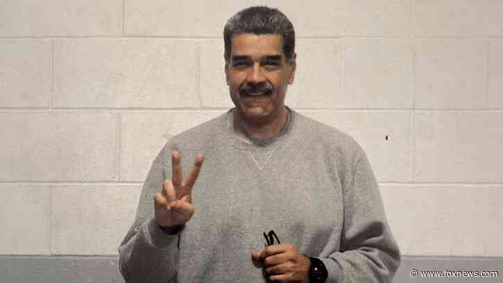 Nicolás Maduro flashes peace signs in first prison photos since US capture in Caracas