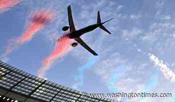 Dramatically low flyby by passenger jets over packed South African stadium sparks safety debate