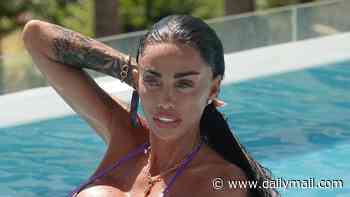 Katie Price squeezes into a barely-there purple bikini as she goes for a swim in Marbella after removing her wedding ring