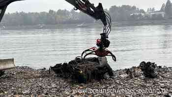 Niedrigwasser im Rhein: Menschenknochen und altes Autowrack freigelegt