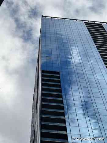Downtown Austin resident raises safety concerns after falling glass damages vehicle near high-rise