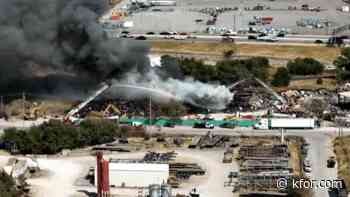 Crews battle large fire at southeast Oklahoma City salvage yard