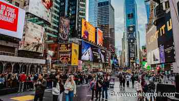 Woman wielding knife in busy Times Square is shot by police in front of hundreds of tourists