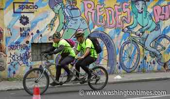 Tandem bicycle club in Ecuador's capital leads blind riders to new adventures