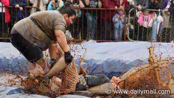 That's one way to spend a bank holiday Monday! Huge crowds gather for the World Gravy Wrestling Championships