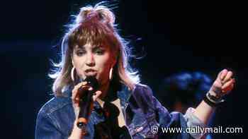 '80s pop icon Debbie Gibson flaunts her incredible figure on stage in a VERY skimpy outfit at age 56