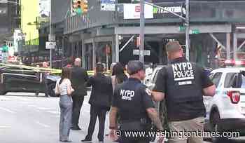Woman killed by police after stabbing 2 in New York's Times Square, killing 1