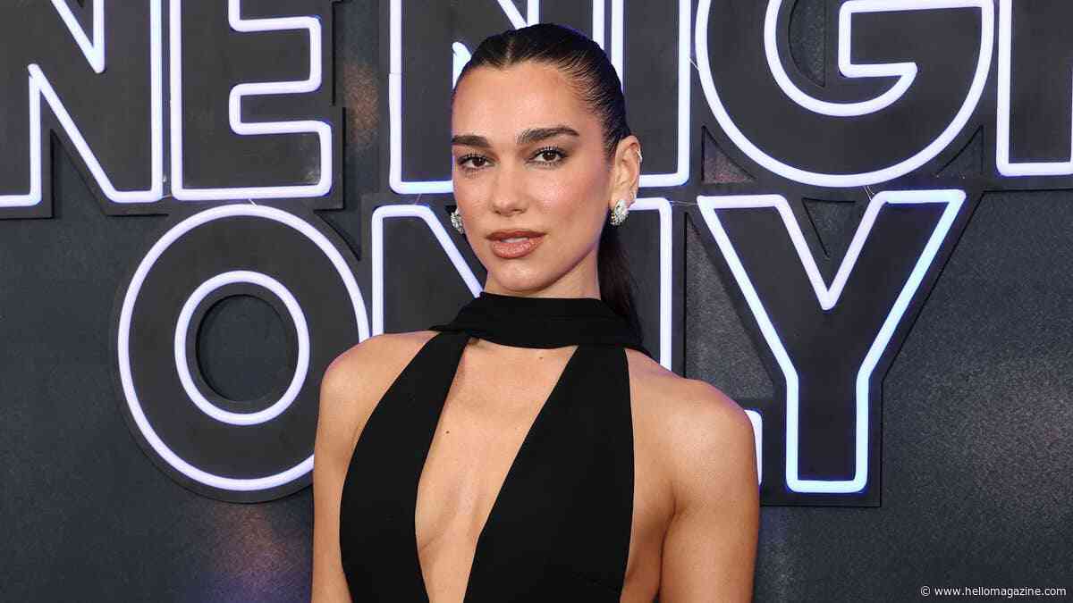 Dua Lipa perfects transitional dressing in daring sheer top