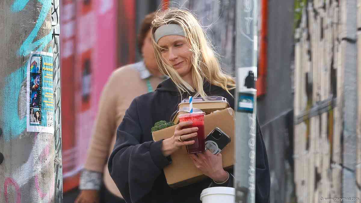AFL WAG Dee Salmin looks downcast as she steps out in Melbourne after insisting decision to boycott Brownlow after Swans hotel scandal was 'taken out of context'