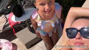 Ola Jordan shows ex James what he's missing as she poses in a leopard print bikini while getting used to life as a single mum on holiday with daughter Ella after 'incredibly tough' split