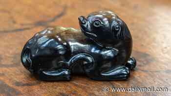 Chinese jade dog with 'magical history' dating back 600 years was bought for £1 at car boot sale... but could now fetch up to £10,000