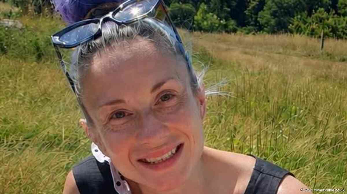 Woman dies after being struck by train