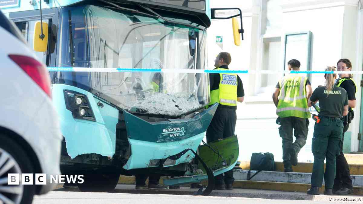 Five injured after bus crashes into 12 parked cars