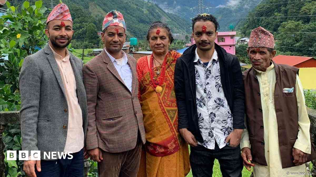 Man's agonising search for family in flood-hit Nepal