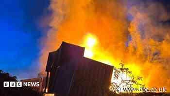 Huge recycling centre blaze 'caused by battery'